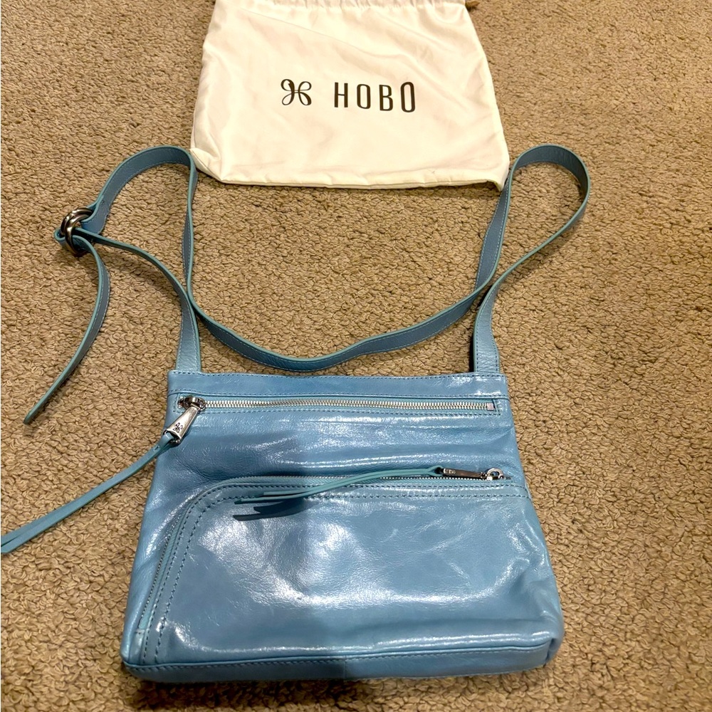 HOBO Blue Crossbody Bag with Sleek Design